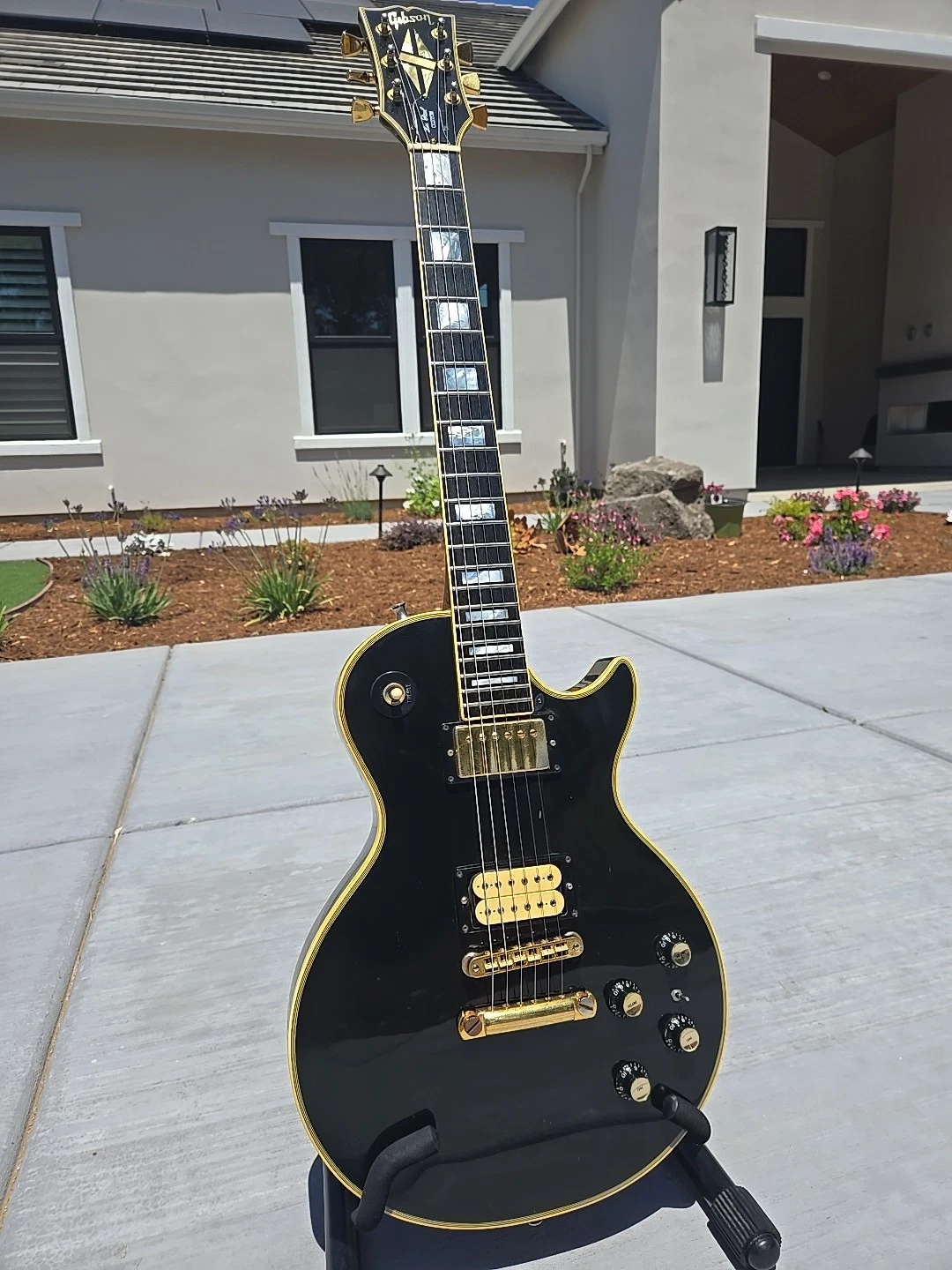 Vintage Gibson Les Paul Black Beauty guitar we buy